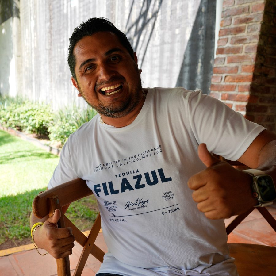 Sergio Cruz, Master Distiller, wearing a FILAZUL shirt at the distillery